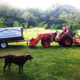 Tractor working on a New Jersey turkey farm with farm dog at Spring Valley Turkey Farm