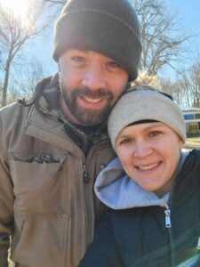 Emily and Trevon Robinson, owners of Spring Valley Turkey Farm in Old Bridge, New Jersey, posing outdoors together during winter.Emily and Trevon Robinson, owners of Spring Valley Turkey Farm in Old Bridge, New Jersey, posing outdoors together during winter.