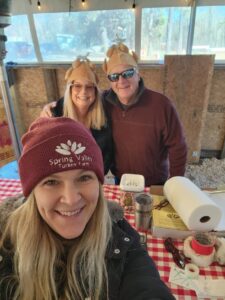 Happy customers visiting Spring Valley Turkey Farm in New Jersey during the holiday season.